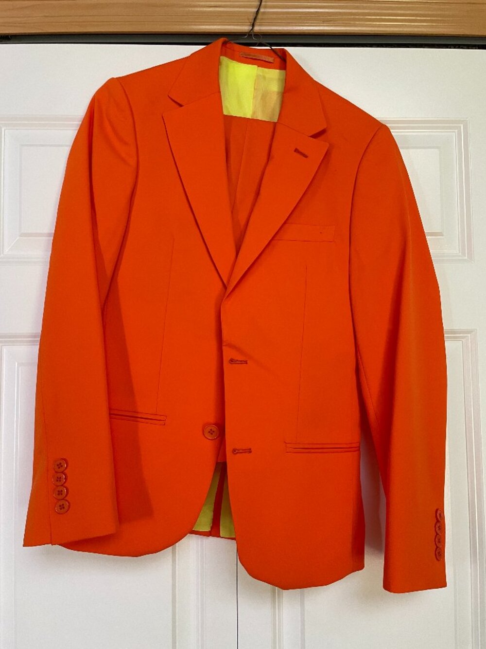 Men's size 34 British brand Boohooman bright orange suit.